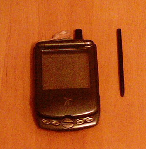 A Treo 180 smartphone with home-made stylus.