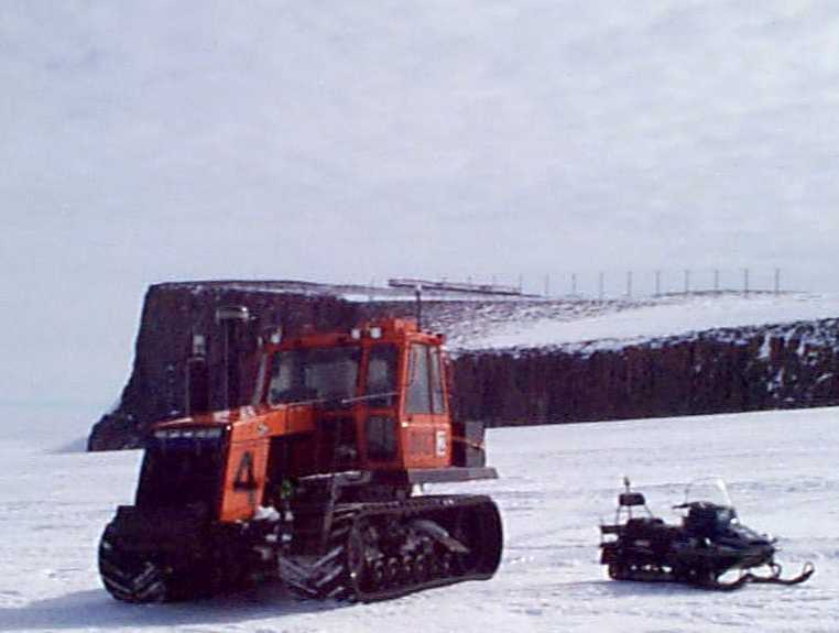 A Caterpillar Challenger DV87, and a Yamaha skidoo