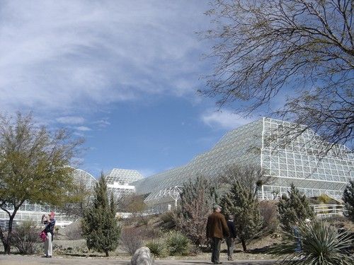 An outside view of the glass and steel structure of Biosphere 2.