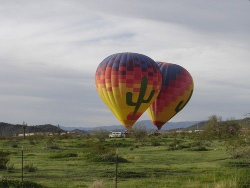 Two hot-air balloons launcing.