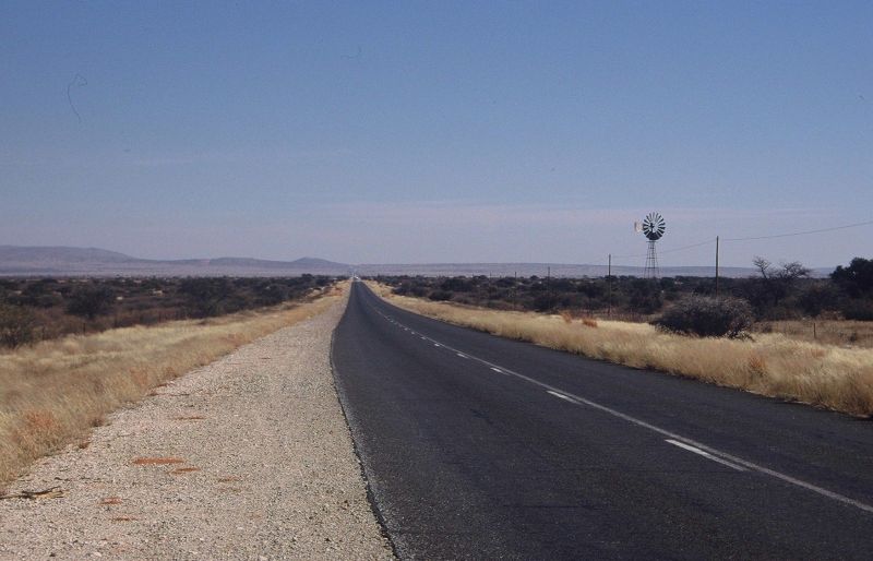 A long road disappearing in the distance.
